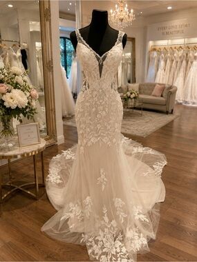 This dress is gorgeous! Lace Embellished V-Neck Wedding Dress in Ivory